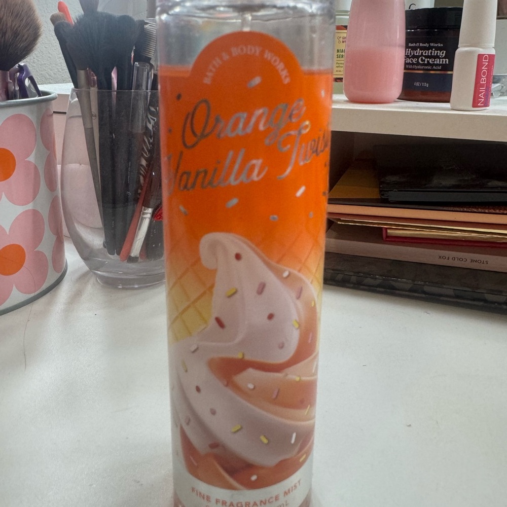 Almost full bath and body works orange vanilla body spray.